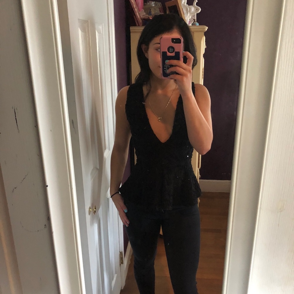 Black knitted peplum top